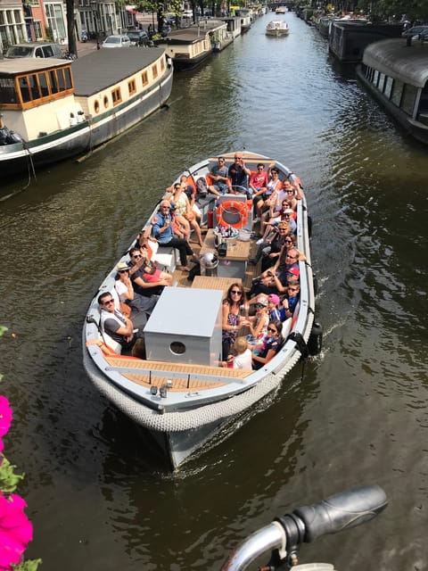 Visit Amsterdam by Boat with a French Guide (french) - Oosterdokskade 8, your easy start near Centraal