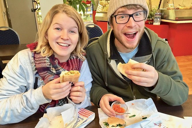 Walking Rotterdam Food Tour - Markthal: where fried fish and paid restroom realities show up
