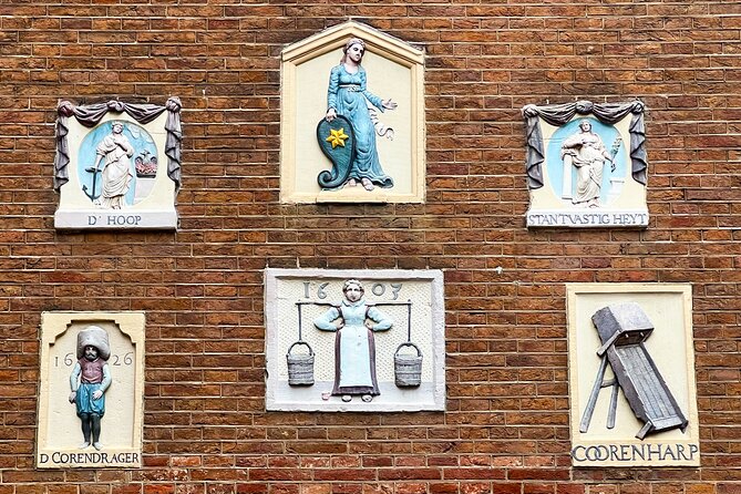 Walking Tour about Golden Age Architecture, private local guide - Huis Bartolotti: red brick, sandstone carvings, and Italian trading ties
