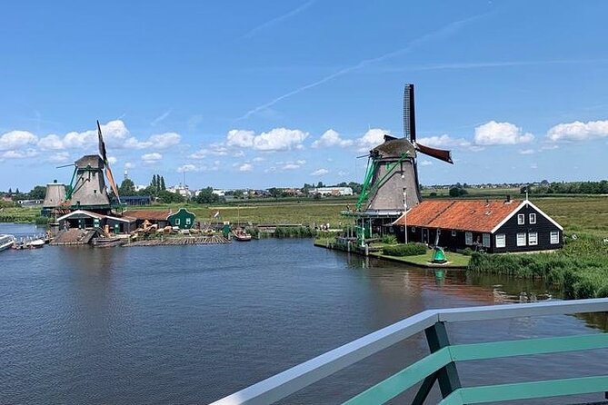 Zaanse Schans Giethoorn Private Tour from Amsterdam Canal Cruise - Zaanse Schans: windmills on the Zaan, plus a guide who can explain the tech